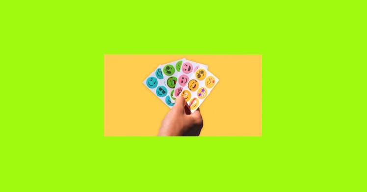 BuzzPatch insect repellant stickers against a green background