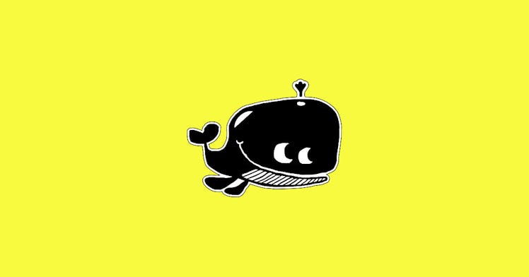 a black teething toy shaped like a whale, set against a bright-yellow background, one of our picks f...