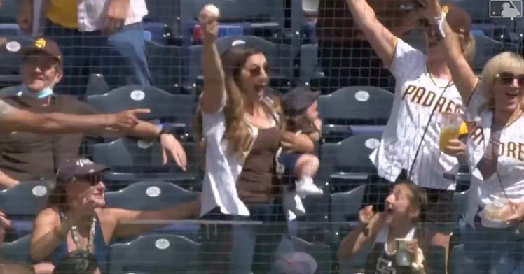 A mom caught a foul ball one handed