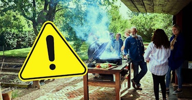 A family stands beside a smoking grill with an image of a danger sign overlaid