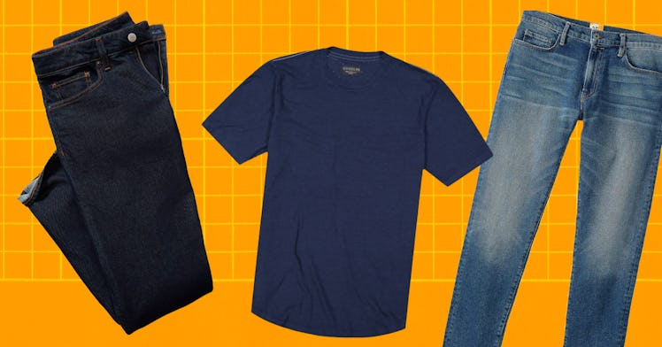 a blue tshirt and two pairs of jeans are pictured against an orange backdrop