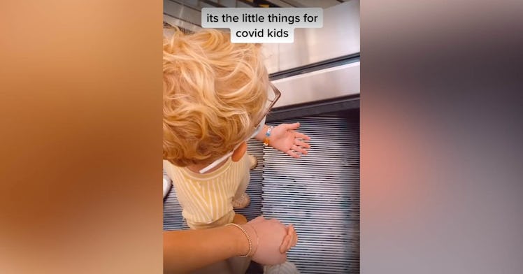 A kid is mesmerized at an escalator in a viral TikTok