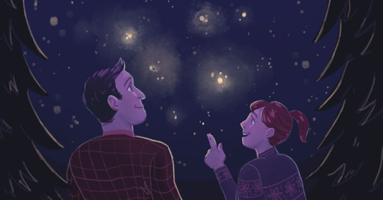 a dad and a daughter stargazing during a 2021 astronomical event