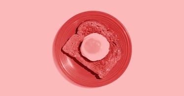 sepia edit of a sample military diet: half a boiled egg on a slice of toast