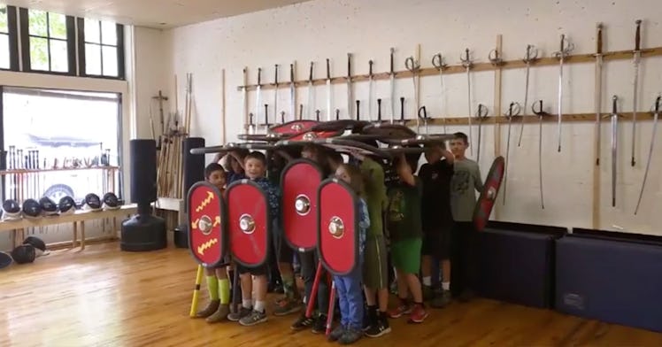 Kids show off Roman testudo formation