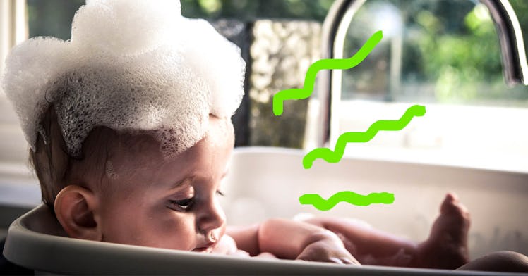 A stinky baby gets a bath