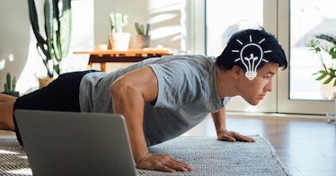 A guy does a push-up, a light-bulb is drawn over his brain