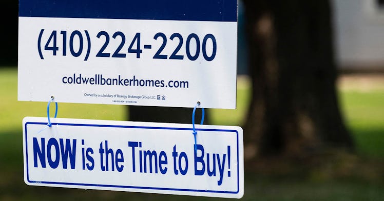 A sign of a house for sale