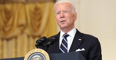 Biden speaks at a podium