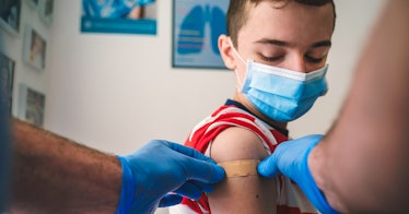 A kid gets vaccinated
