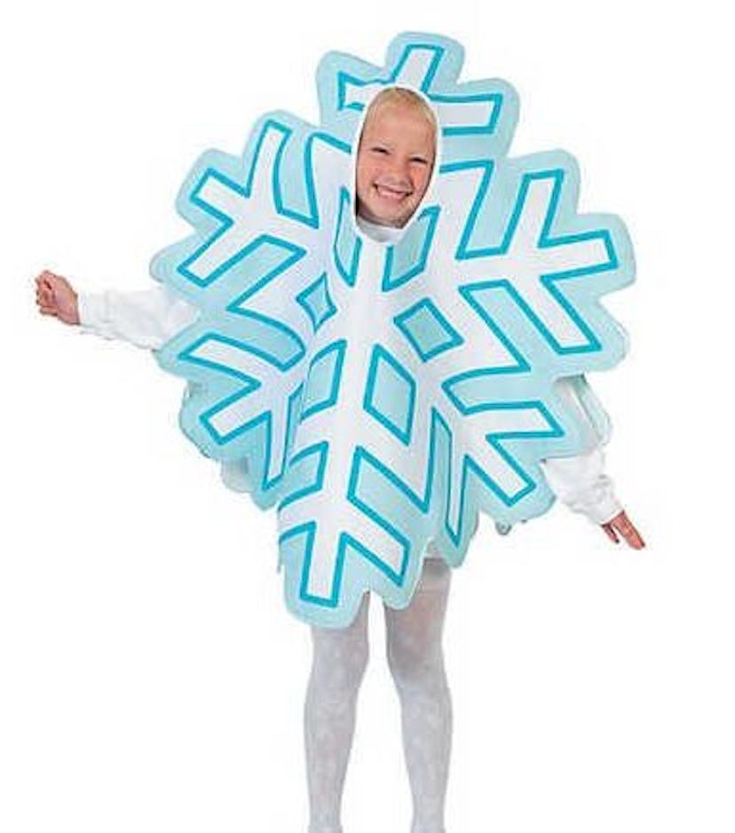 A little girl wearing a Snowflake costume