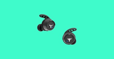 A pair of black JBL wireless earbuds on a blue background.