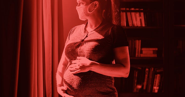 redscale edit of a pregnant person holding their baby bump while wearing a mask