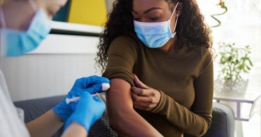 a child receives a vaccine.