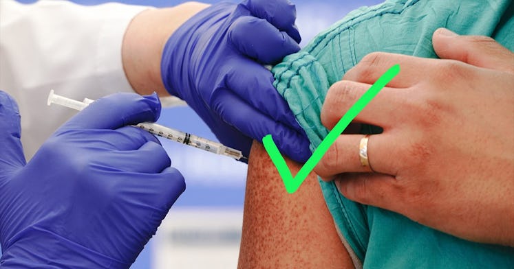 a person receives a COVID booster shot, with a green check mark edited over the image