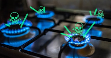 A gas stove with all four burners on and animated green skulls over their flames.
