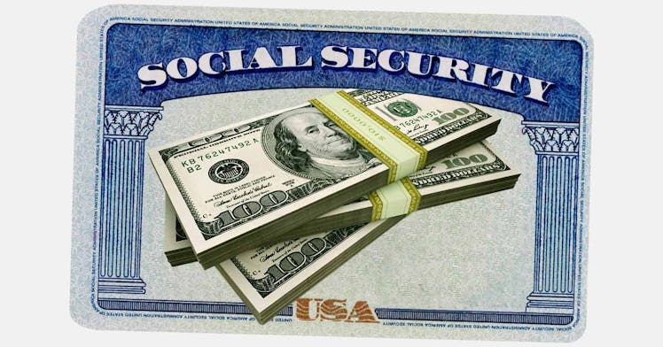 A social security card with some dollar bills on it