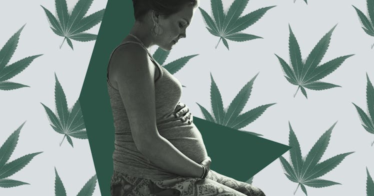 A pregnant woman holding her stomach on a blue backdrop with green cannabis leaves.