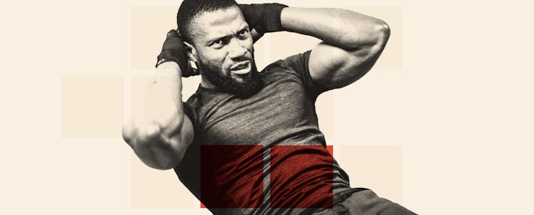 A man doing sit ups in a black workout shirt and gloves to work his "lower abs."