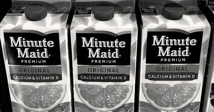 boxes of minute maid juice in black and white