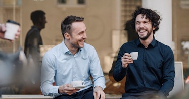 men_drinking_coffee_laughing