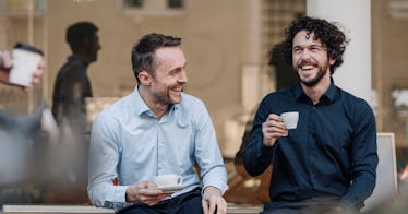 men_drinking_coffee_laughing