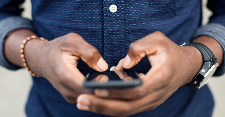 A man sending helpful texts to his partner because they are having a bad day.