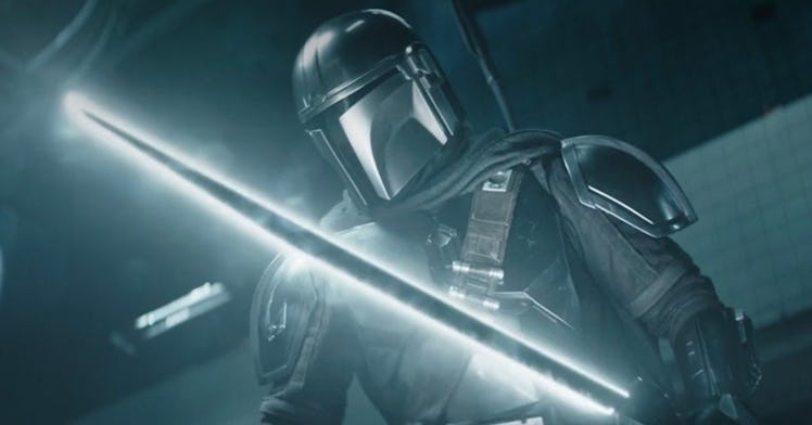 Mando in Boba Fett holding darksaber