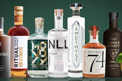 8 non-alcoholic gins on a green background with lemons on the right and mint on the side