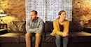 Unhappy couple on couch