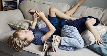 boy looking at phone screen time