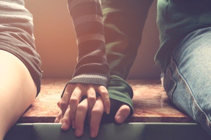 Close-up-of-couple-holding-hands