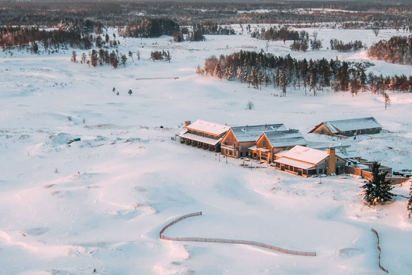 Aerial view of a snowy winter resort.