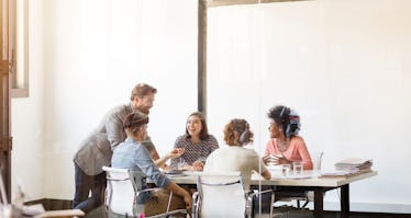 Group of professionals talking in a conference room