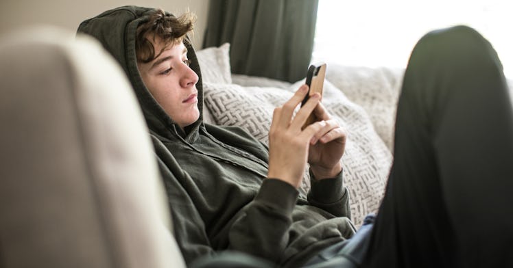 teen using smart phone