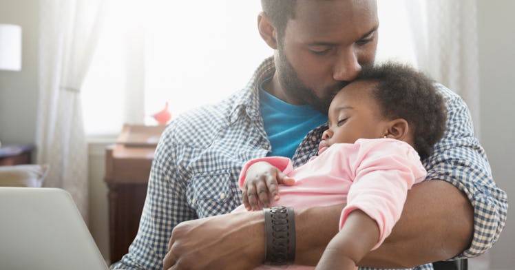 baby names dad holding kiddo
