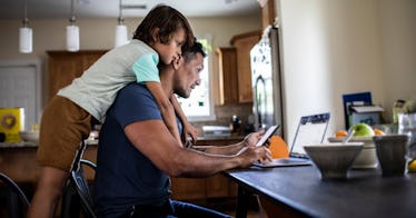 dad on the computer doing taxes