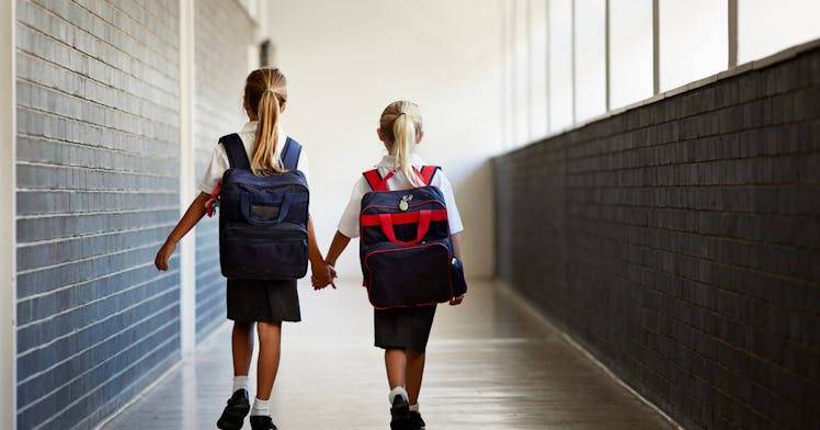 poverty girls walking through school