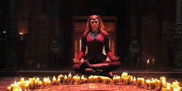 Wanda from "Doctor Strange 2" performing a spell surrounded by candles. 