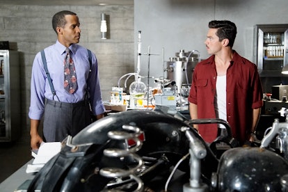 Jason Wilkes in ‘Agent Carter' standing next to his co-star in a lab with various machines and chemi...
