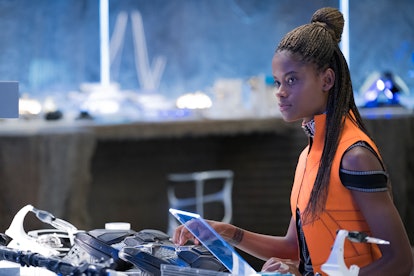 Shuri, t'challas sister in the black panther movie working in a lab as a technological wizard