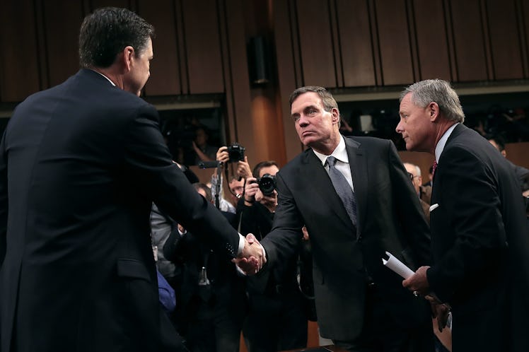 WASHINGTON, DC - JUNE 08: Former FBI Director James Comey (L) is greeted by Senate Intelligence Comm...