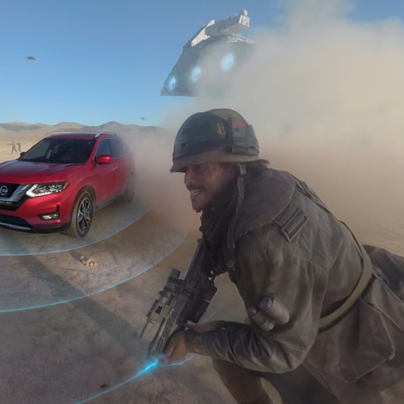 A red Nissan car driving to a dusty 'Star Wars' battle scene