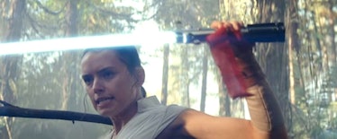 Rey with the Skywalker lightsaber in the D23 'Rise of Skywalker' trailer