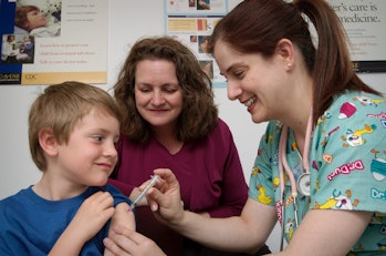 boy receives vaccine