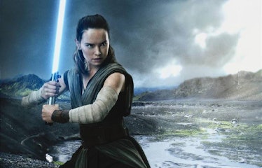 Rey (Daisy Ridley) wields Luke Skywalker's old blue lightsaber in 'The Last Jedi'.
