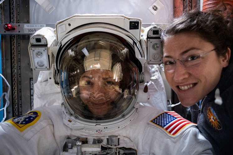 NASA astronauts Jessica Meir (left) and Christina Koch prepare on the International Space Station fo...