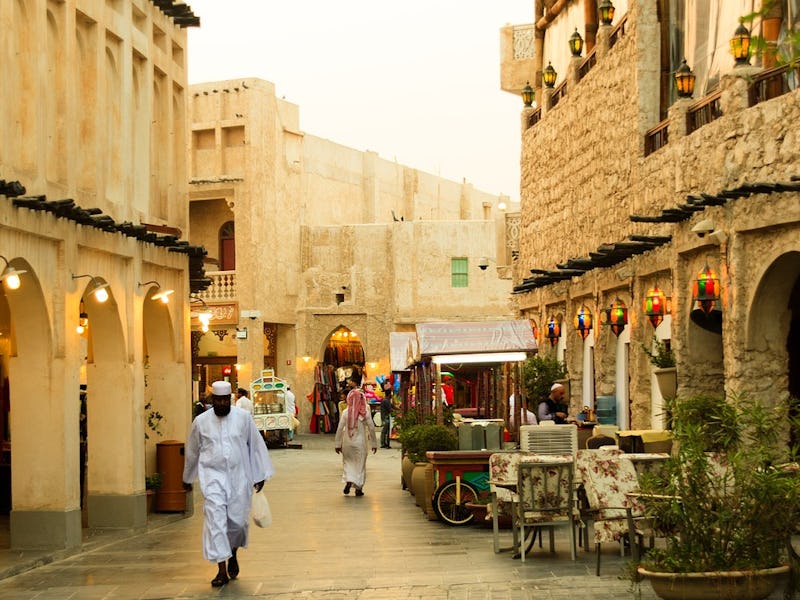 A street with old buildings with no use of A/C outside