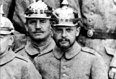 An artist in a soldier's uniform. Klee is in the center of this photo shot during World War I.
