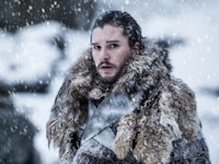 Kit Harington as Jon Snow wearing fur while it is snowing outside